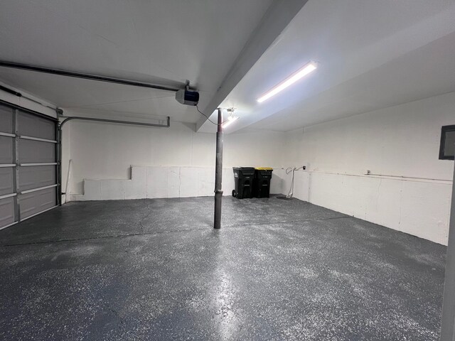 1170 Singleton Dr, Roselle, IL 60172 - garage featuring a garage door opener