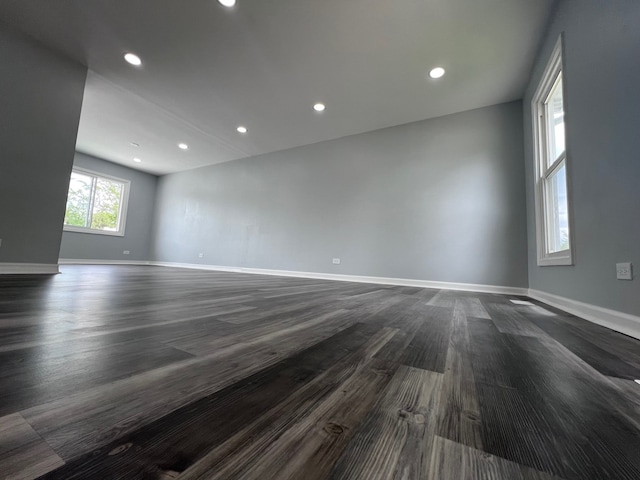 1170 Singleton Dr, Roselle, IL 60172 - unfurnished room featuring baseboards, dark wood-type flooring, and recessed lighting