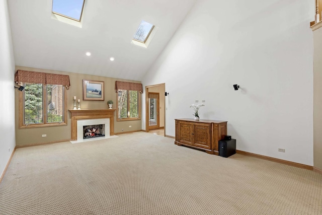 10440 Deer Chase Ave, Orland Park, IL 60467 - unfurnished living room with a fireplace with flush hearth, a skylight, baseboards, and carpet floors