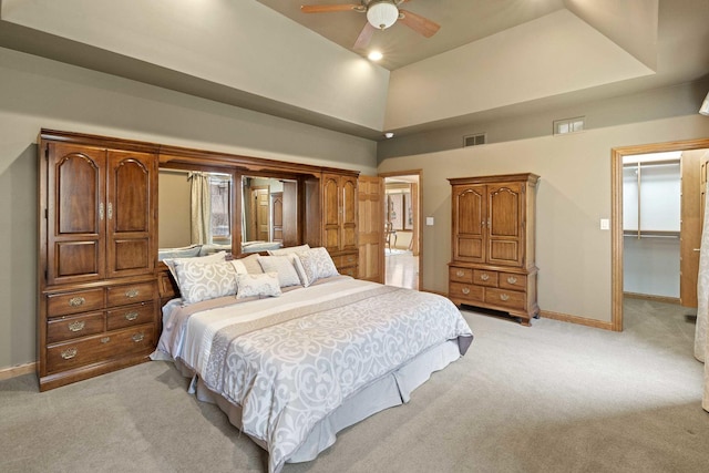 10440 Deer Chase Ave, Orland Park, IL 60467 - bedroom with visible vents, baseboards, a spacious closet, ceiling fan, and light colored carpet