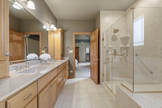10440 Deer Chase Ave, Orland Park, IL 60467 - bathroom featuring tile patterned floors, double vanity, a sink, and a stall shower