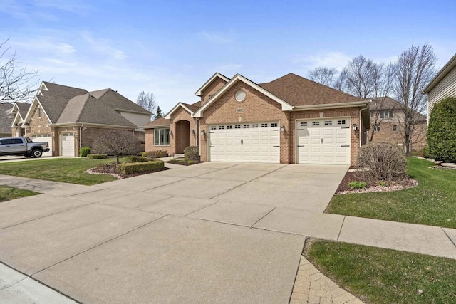10440 Deer Chase Ave, Orland Park, IL 60467 - view of front of home with brick siding, driveway, an attached garage, and a front lawn