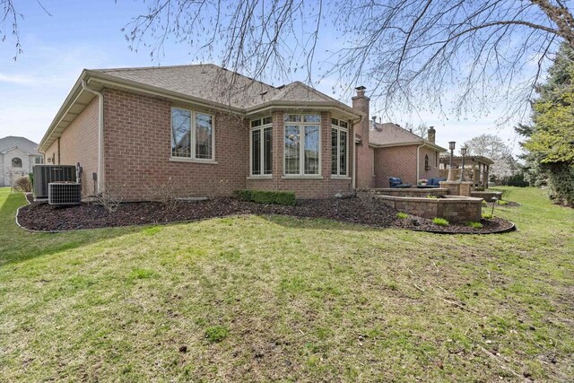 10440 Deer Chase Ave, Orland Park, IL 60467 - view of side of property featuring cooling unit, a lawn, a patio, brick siding, and a chimney