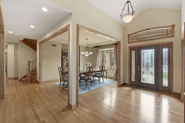 10440 Deer Chase Ave, Orland Park, IL 60467 - entrance foyer with visible vents, an inviting chandelier, light wood-style floors, stairs, and lofted ceiling