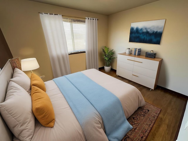 bedroom featuring baseboards and dark wood-style flooring