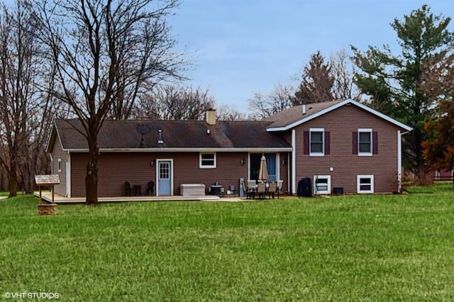 2606 Martin Dr, Spring Grove, IL 60081 - rear view of house with a lawn, a chimney, and a patio