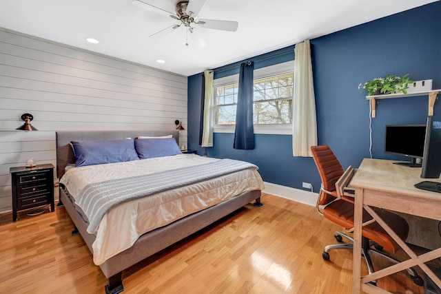 bedroom featuring recessed lighting, wood finished floors, baseboards, and ceiling fan