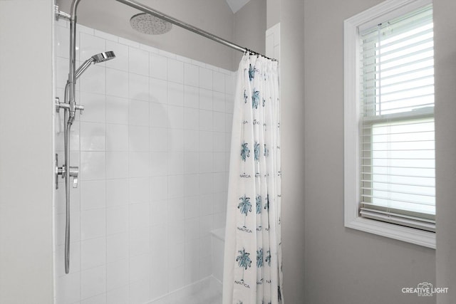 full bath with tiled shower