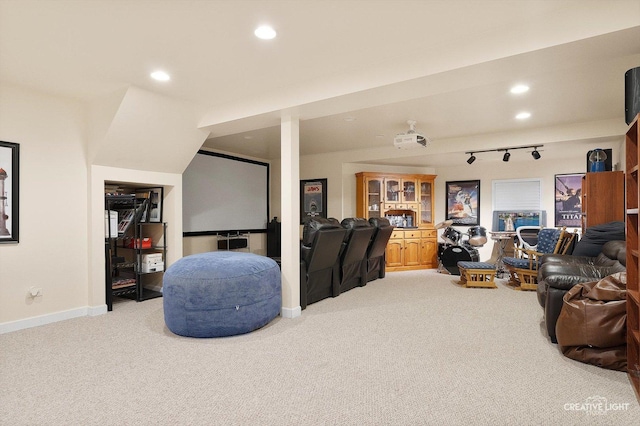 living area with carpet floors, recessed lighting, baseboards, and track lighting