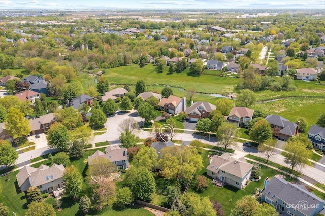 aerial overview of property's location with nearby suburban area
