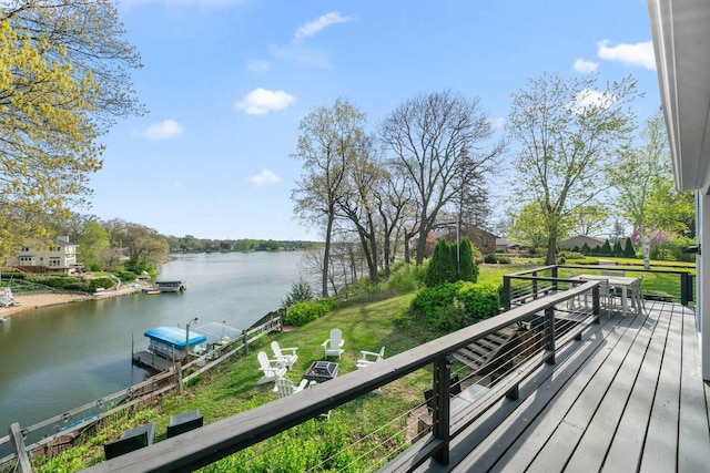 209 Oak Cv, Lake Holiday, IL 60552 - wooden terrace with a yard, a water view, and a dock