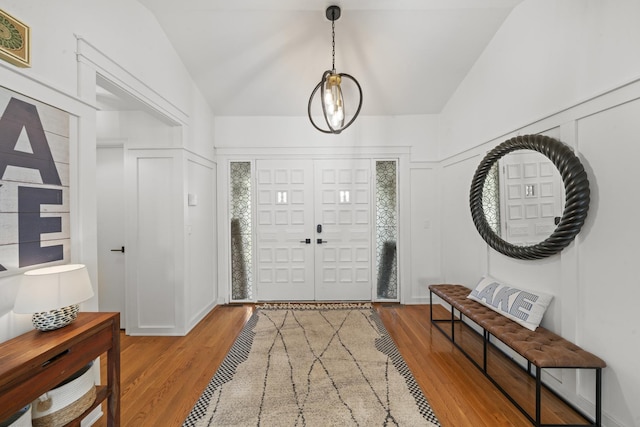 209 Oak Cv, Lake Holiday, IL 60552 - entrance foyer featuring wood finished floors and lofted ceiling