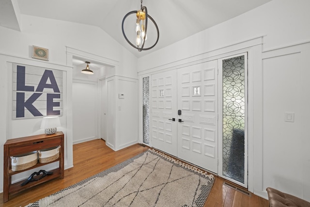 209 Oak Cv, Lake Holiday, IL 60552 - entryway with wood finished floors and lofted ceiling