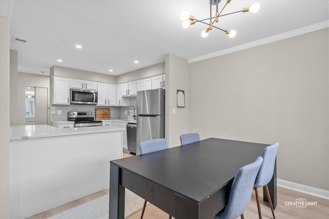 4425 Blackhawk Ln Unit 201, Lisle, IL 60532 - dining space with a chandelier, light wood-type flooring, crown molding, and recessed lighting