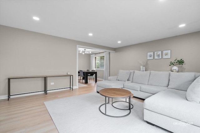 4425 Blackhawk Ln Unit 201, Lisle, IL 60532 - living area featuring wood finished floors, a chandelier, and recessed lighting
