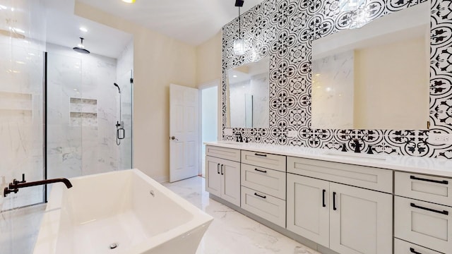 full bathroom with a sink, a soaking tub, double vanity, marble finish floor, and a stall shower