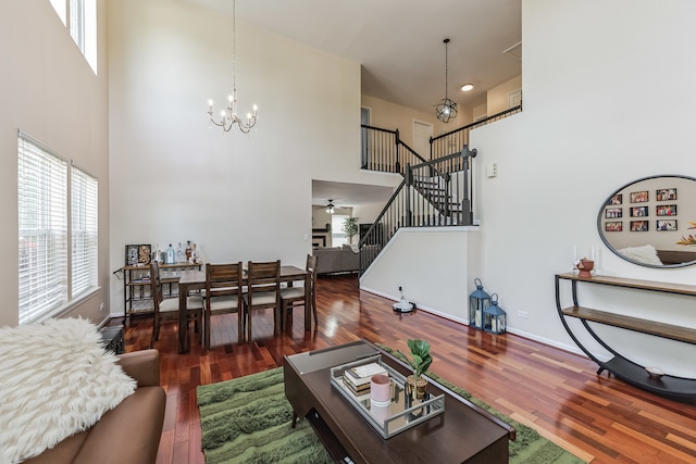 2704 Flagstone Cir, Naperville, IL 60564 - living area with a towering ceiling, a wealth of natural light, and stairs