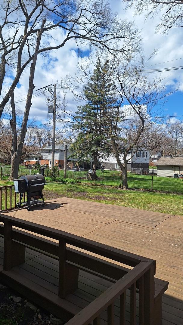 1344 Jeffery Dr, Homewood, IL 60430 - wooden terrace with a yard and a grill