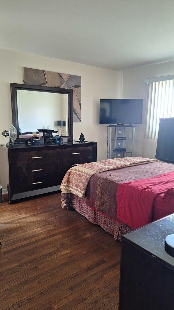 1344 Jeffery Dr, Homewood, IL 60430 - bedroom featuring dark wood-style flooring