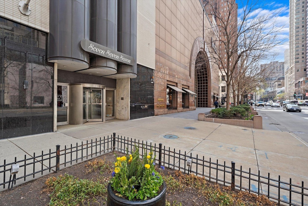 777 N Michigan Ave Unit 3705, Chicago, IL 60611 - view of exterior entry featuring fence