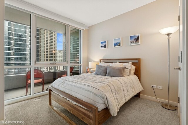 505 N Mcclurg Ct Unit 1801, Chicago, IL 60611 - bedroom featuring carpet, expansive windows, and baseboards