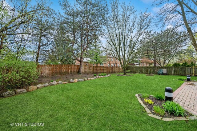 view of yard featuring a fenced backyard