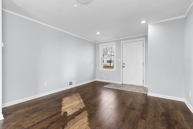 206 Franklin Pl, Rockford, IL 61103 - foyer entrance featuring ornamental molding, baseboards, wood finished floors, and recessed lighting