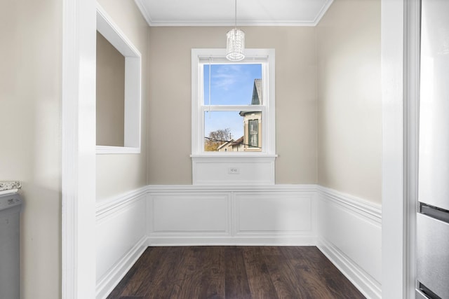 206 Franklin Pl, Rockford, IL 61103 - detailed view of wood finished floors, wainscoting, ornamental molding, and a chandelier