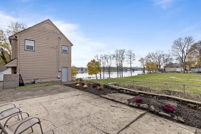 206 Franklin Pl, Rockford, IL 61103 - view of property exterior with a patio area and a water view