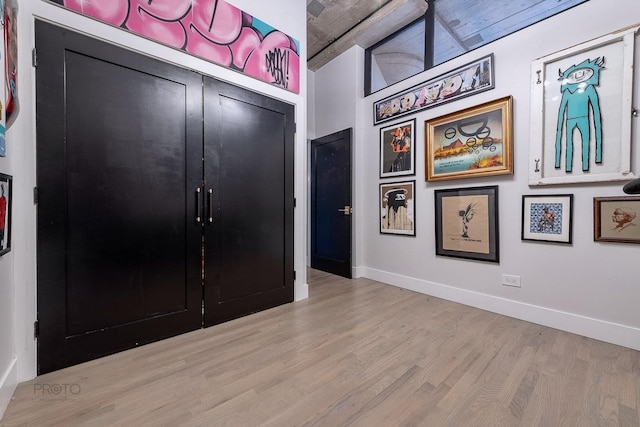 1070 W 15th St Unit 302, Chicago, IL 60608 - entrance foyer featuring wood finished floors and baseboards