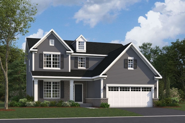 view of front of house with brick siding, driveway, an attached garage, and a front lawn