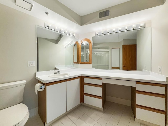 7120 N Milwaukee Ave Unit 305, Niles, IL 60714 - bathroom with vanity and tile patterned flooring