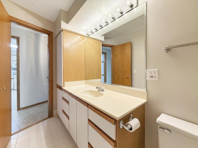 7120 N Milwaukee Ave Unit 305, Niles, IL 60714 - bathroom with vanity and tile patterned flooring