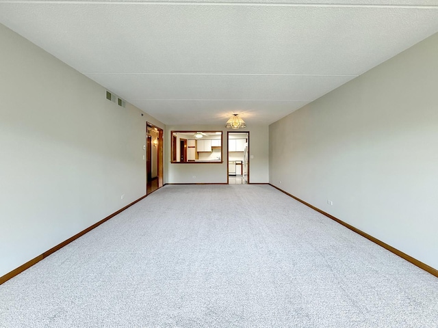 7120 N Milwaukee Ave Unit 305, Niles, IL 60714 - unfurnished living room with light carpet and baseboards