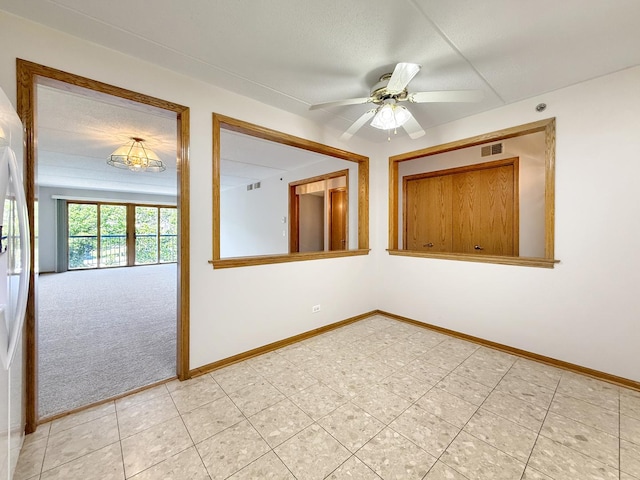 7120 N Milwaukee Ave Unit 305, Niles, IL 60714 - unfurnished room with ceiling fan and a textured ceiling