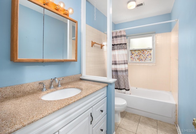 full bathroom featuring toilet, vanity, shower / bathtub combination with curtain, and tile patterned flooring