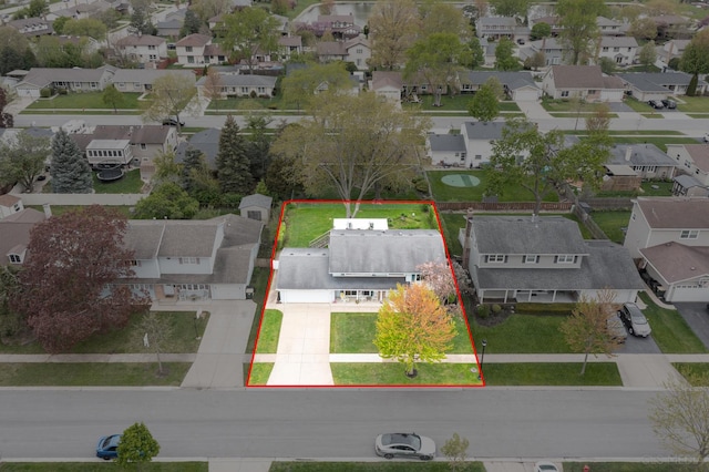 aerial view of residential area with property parcel outlined