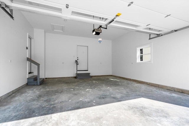garage featuring baseboards and a garage door opener