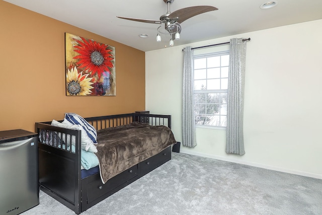 carpeted bedroom featuring ceiling fan, recessed lighting, and baseboards