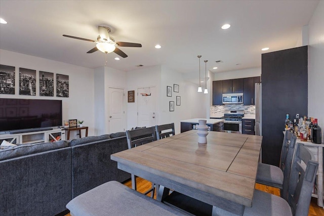 dining room featuring recessed lighting, visible vents, and a ceiling fan