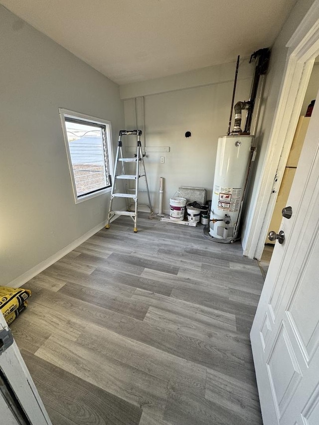 5015 N Kimberly Ave, Chicago, IL 60630 - interior space with baseboards, wood finished floors, and gas water heater