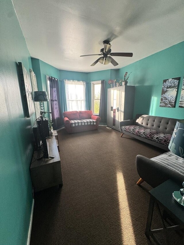 5015 N Kimberly Ave, Chicago, IL 60630 - living room with ceiling fan and carpet flooring