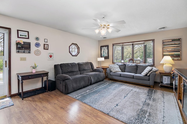 4618 W Hilltop Dr, Kankakee, IL 60901 - living area featuring a ceiling fan and wood finished floors