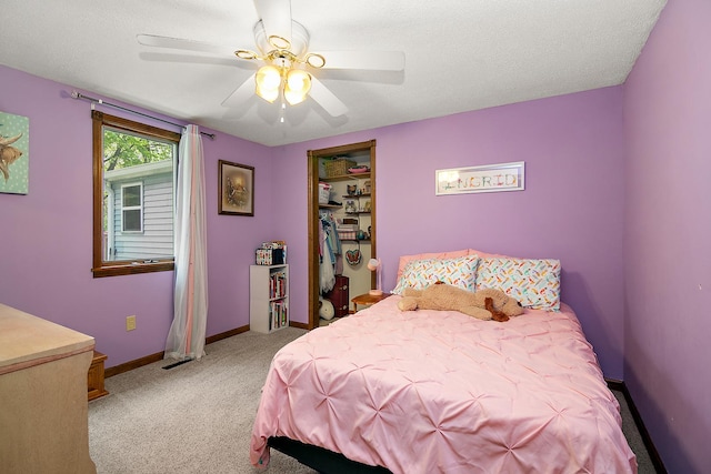 4618 W Hilltop Dr, Kankakee, IL 60901 - carpeted bedroom with baseboards and a ceiling fan