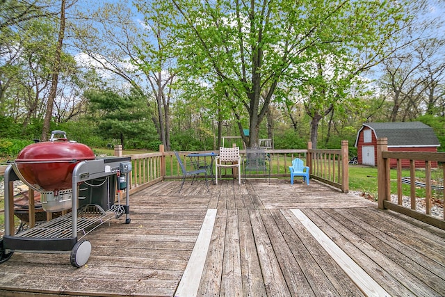 4618 W Hilltop Dr, Kankakee, IL 60901 - wooden deck with view of wooded area and a grill