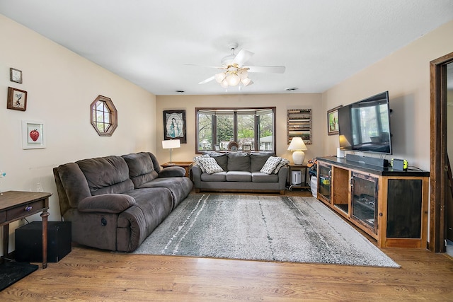 4618 W Hilltop Dr, Kankakee, IL 60901 - living area featuring wood finished floors and ceiling fan
