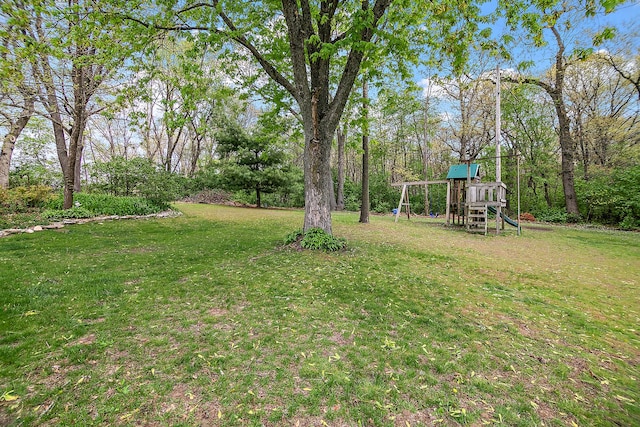 4618 W Hilltop Dr, Kankakee, IL 60901 - view of grassy yard with a playground