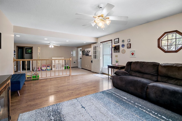 4618 W Hilltop Dr, Kankakee, IL 60901 - living room featuring ceiling fan, wood finished floors, and recessed lighting