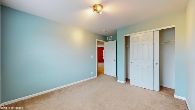 127 Charleston Ln, Gilberts, IL 60136 - unfurnished bedroom with carpet floors, a closet, and baseboards