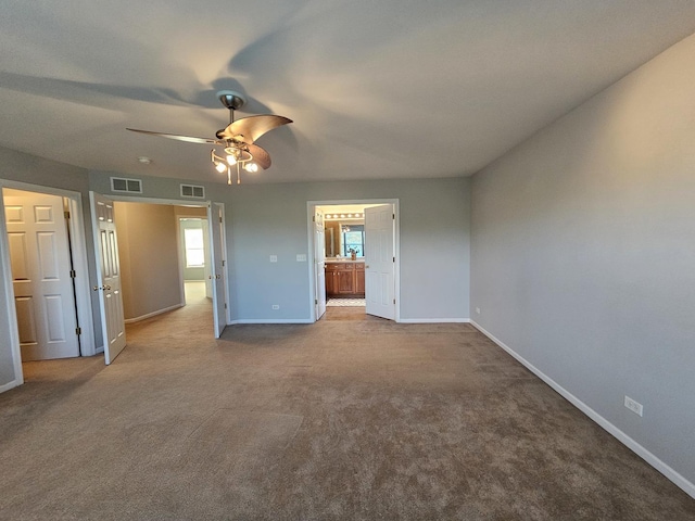 127 Charleston Ln, Gilberts, IL 60136 - unfurnished bedroom featuring carpet, ensuite bathroom, and ceiling fan